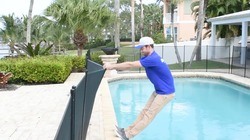 Pool with mesh safety fence removable
