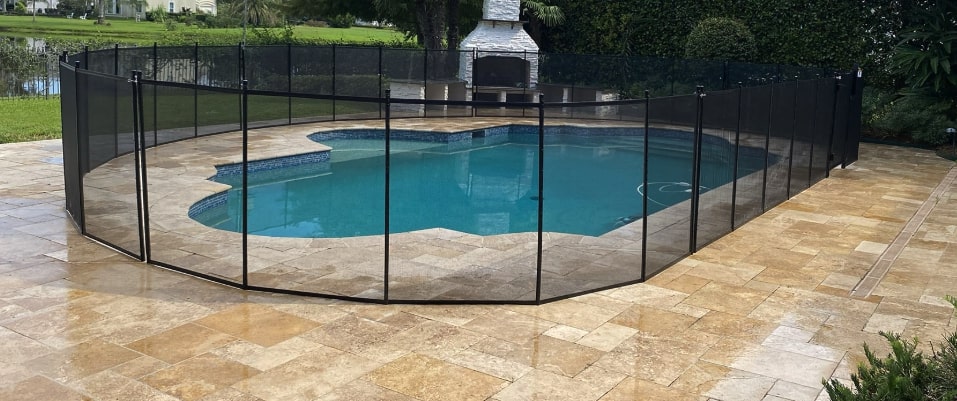 Pool with mesh safety fence removable